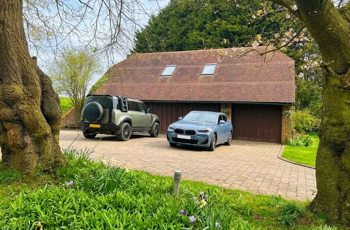 Barnfield triple garage and driveway